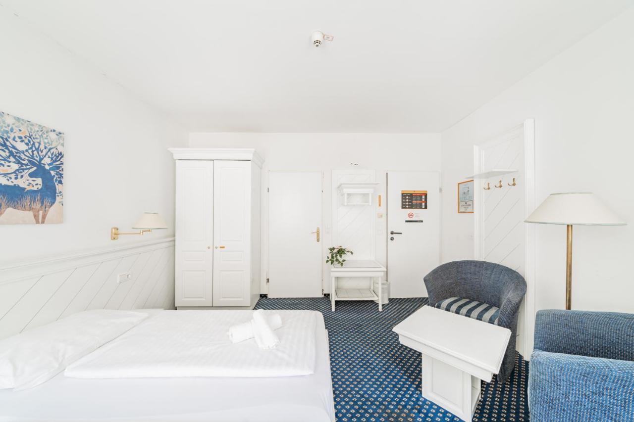 Self-Check-In Hotel Adlon Wina Bagian luar foto