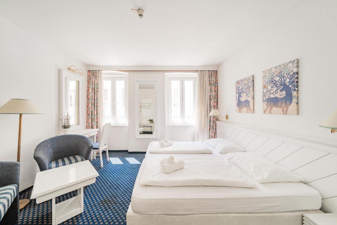 Self-Check-In Hotel Adlon Wina Bagian luar foto
